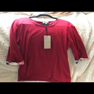Red Burberry cotton woman’s shirt.